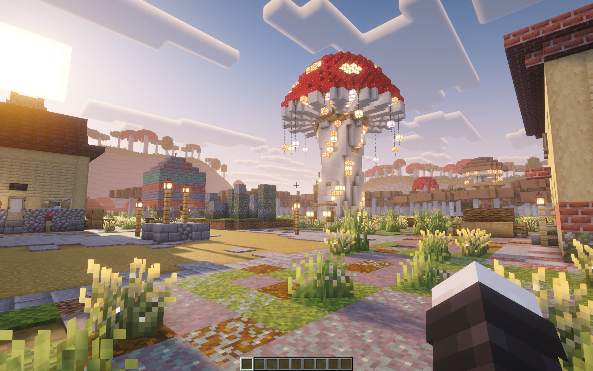 A glowing mushroom tower in a colorful Minecraft village